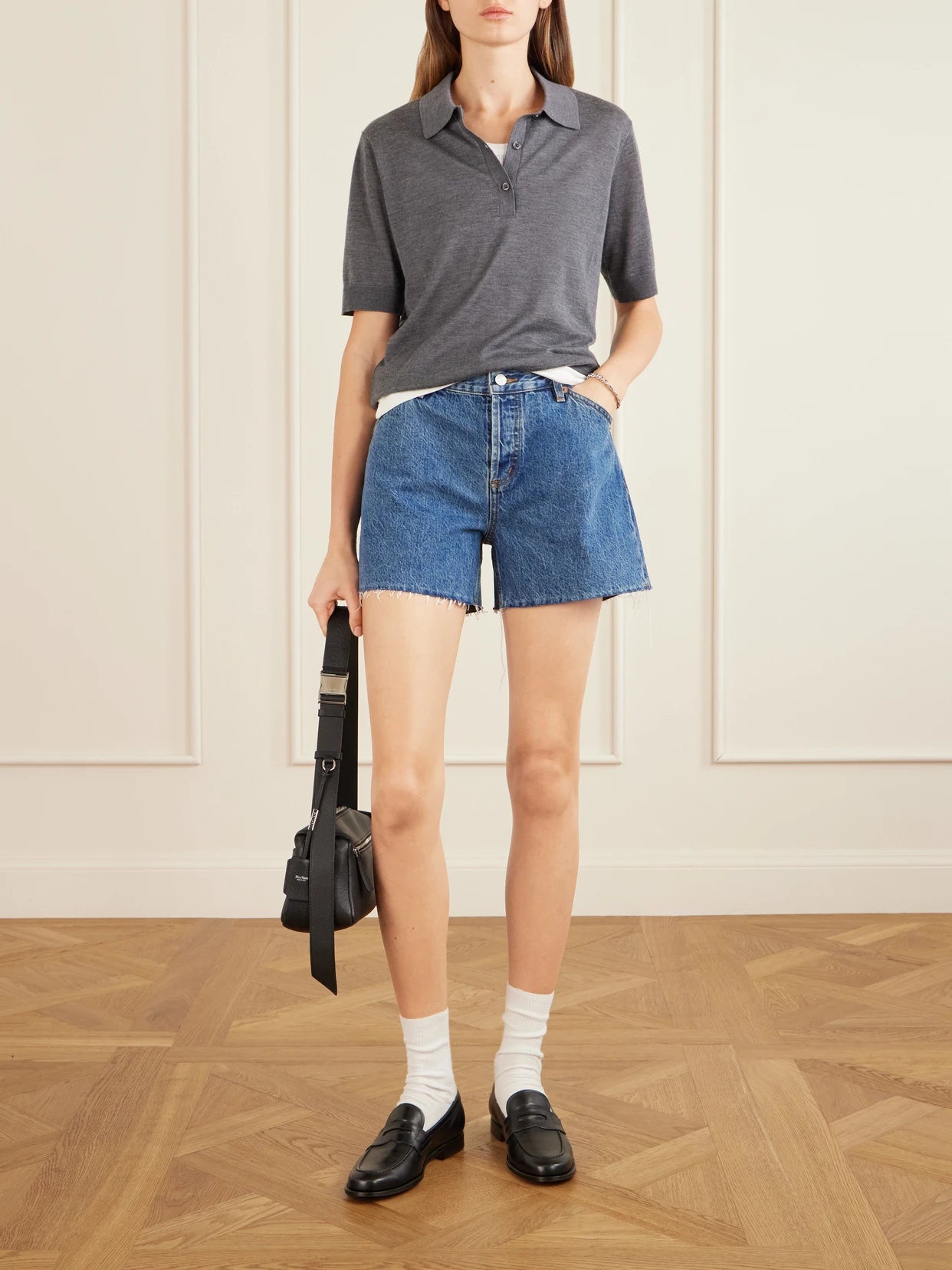 Image of a model wearing Shorts. Product name - Straight-leg Denim Shorts in Mid denim colour by brand - Still Here