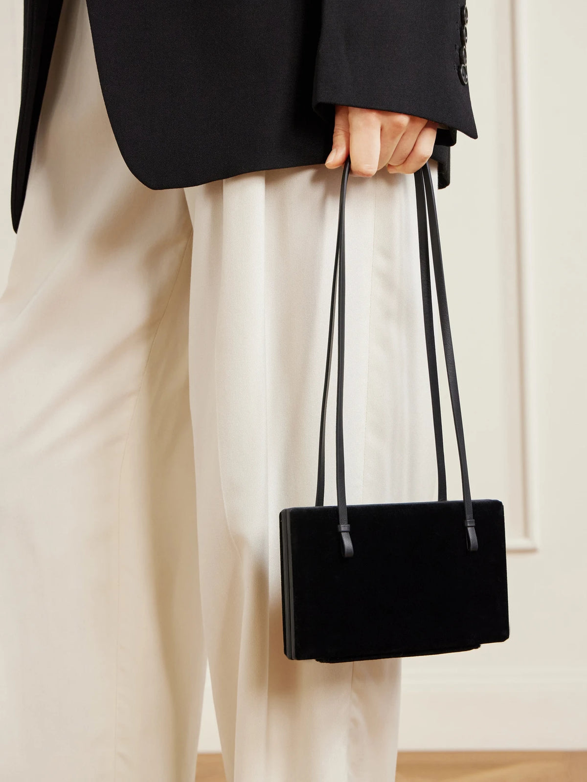 Image of Bags. Product name - Leather-trimmed Velvet Shoulder Bag in Black colour by brand - TOTEME