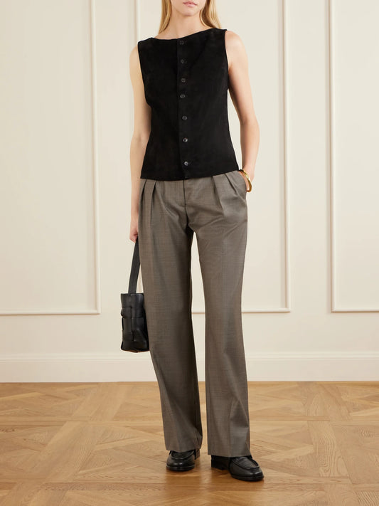 Image of a model wearing Tops. Product name - Mae Suede Vest in Black colour by brand - STOULS