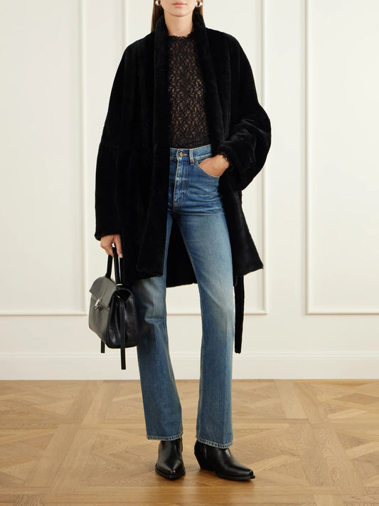 Image of Coats & Jackets. Product name - Raquel Belted Paneled Shearling Coat in Black colour by brand - Nour Hammour