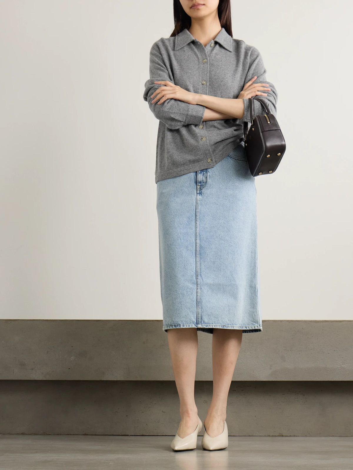 Image of a model wearing Outerwear. Product name - Cashmere Cardigan in Gray colour by brand - TOTEME
