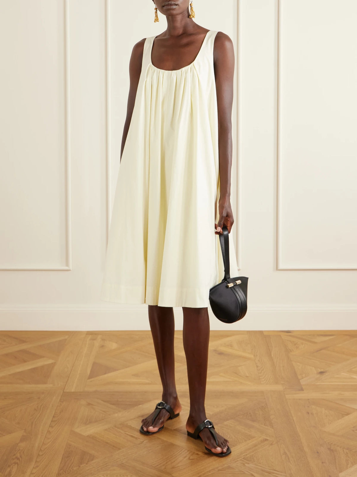 Image of Sandals. Product name - Mionasan Embellished Leather Thong Sandals in Black colour by brand - Manolo Blahnik