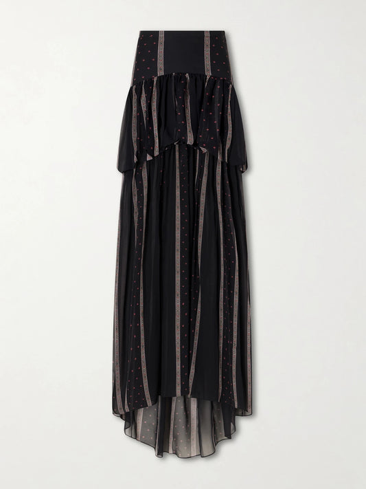 Image of a model wearing Skirts. Product name - Nina Striped Peplum Silk Maxi Skirt in Black colour by brand - LIBEROWE