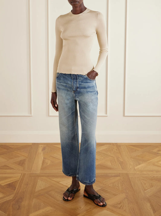 Image of a model wearing Tops. Product name - Ribbed Silk-blend Top in Ecru colour by brand - Alaïa