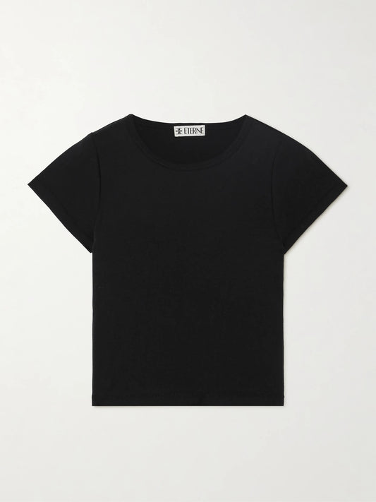 Image of a model wearing Tops. Product name - Short Sleeve Baby Tee Cropped Cotton And Modal-blend Jersey T-shirt in Black colour by brand - ÉTERNE