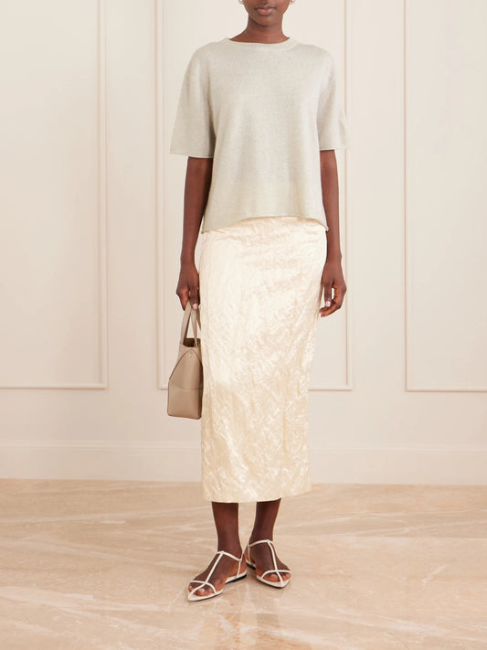 Image of a model wearing Tops. Product name - Cila Cashmere T-shirt in Beige colour by brand - LISA YANG