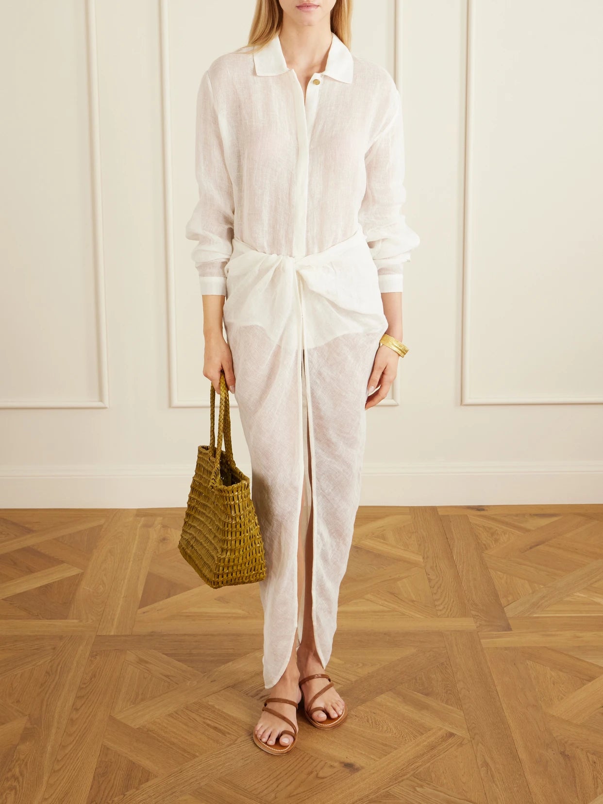 Image of a model wearing Tops. Product name - Sanbu Linen Shirt in White colour by brand - Le Kasha