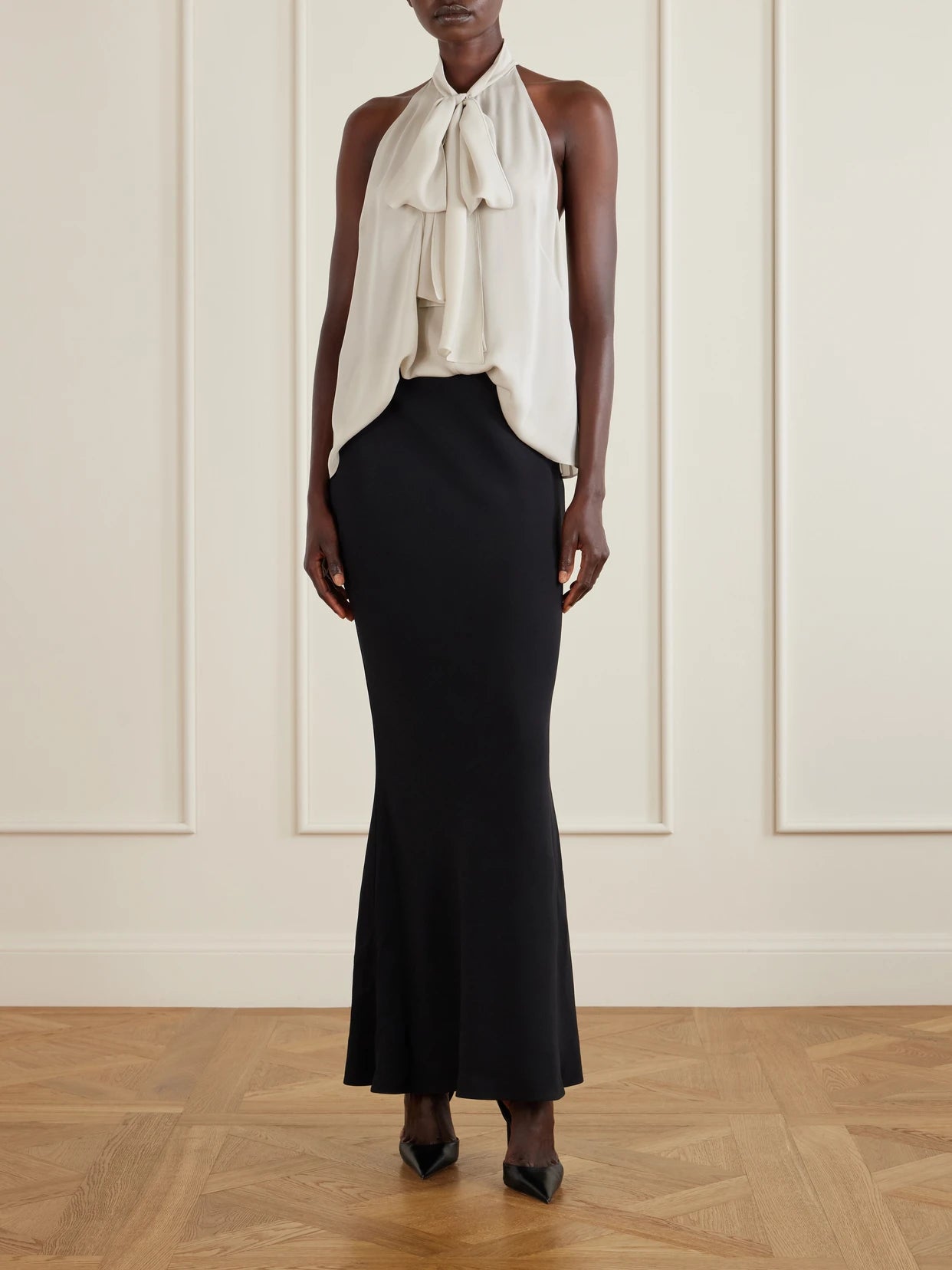 Image of a model wearing Tops. Product name - Halterneck Silk-georgette Blouse in Off-white colour by brand - TOM FORD