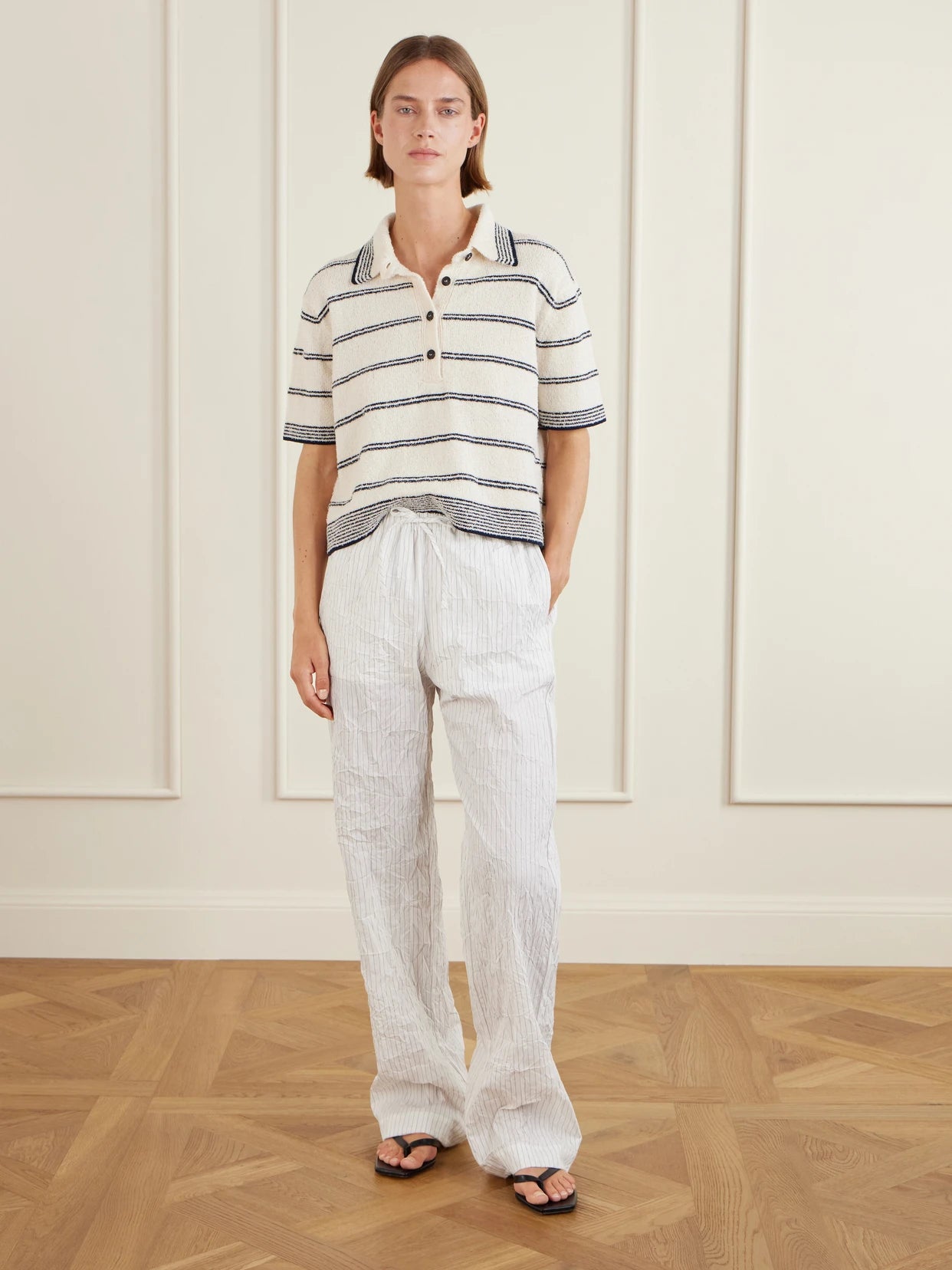 Image of a model wearing Tops. Product name - Striped Cotton-blend Terry Polo Shirt in Multi colour by brand - RÓHE