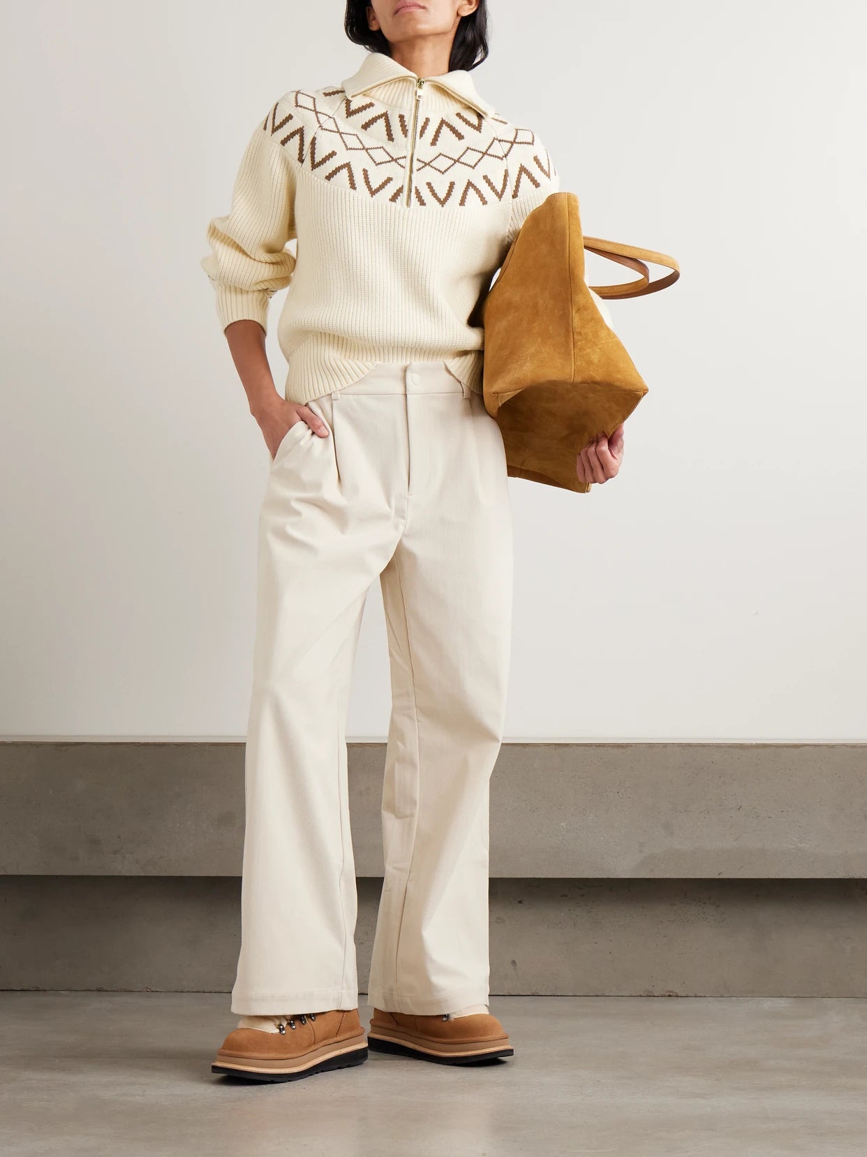 Image of a model wearing Outerwear. Product name - Sigrid Fair Isle Knitted Half-zip Sweater in Cream colour by brand - Varley