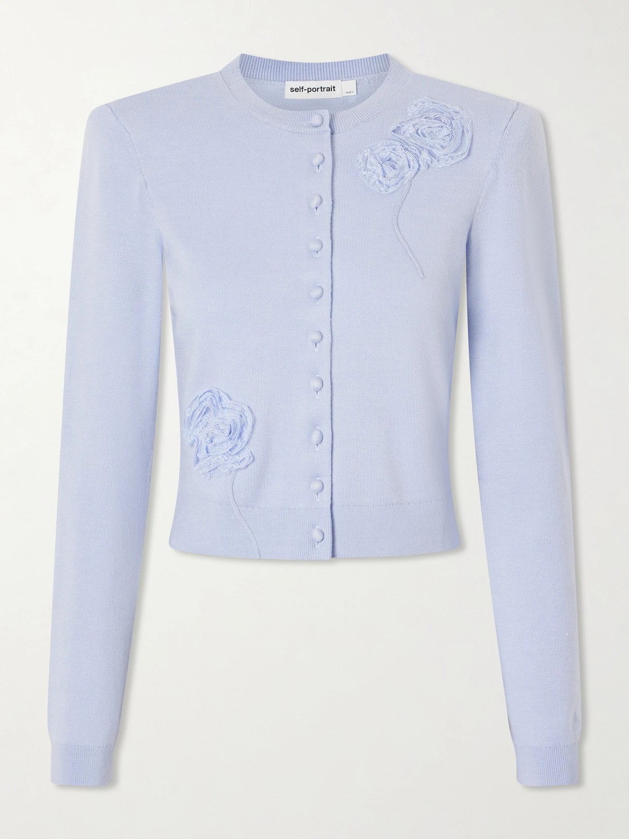 Image of a model wearing Outerwear. Product name - Appliquéd Knitted Cardigan in Blue colour by brand - Self-Portrait