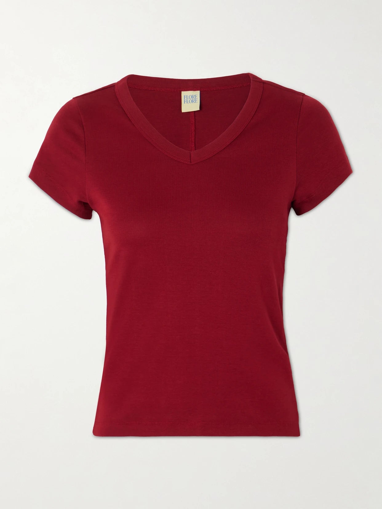 Image of a model wearing Tops. Product name - Jill Baby Organic Cotton-jersey T-shirrt in Burgundy colour by brand - FLORE FLORE