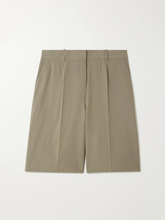 Image of a model wearing Shorts. Product name - Grain De Poudre Shorts in Taupe colour by brand - TOTEME