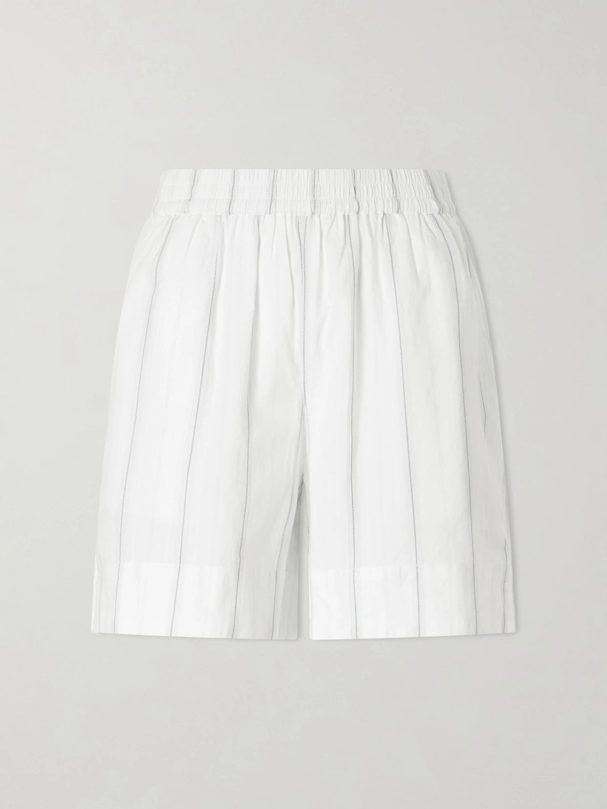 Image of a model wearing Shorts. Product name - Vetiver Striped Organic Cotton Shorts in White colour by brand - SKALL