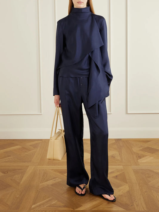 Image of a model wearing Tops. Product name - Scarf-detailed Silk-satin Blouse in Navy colour by brand - RÓHE