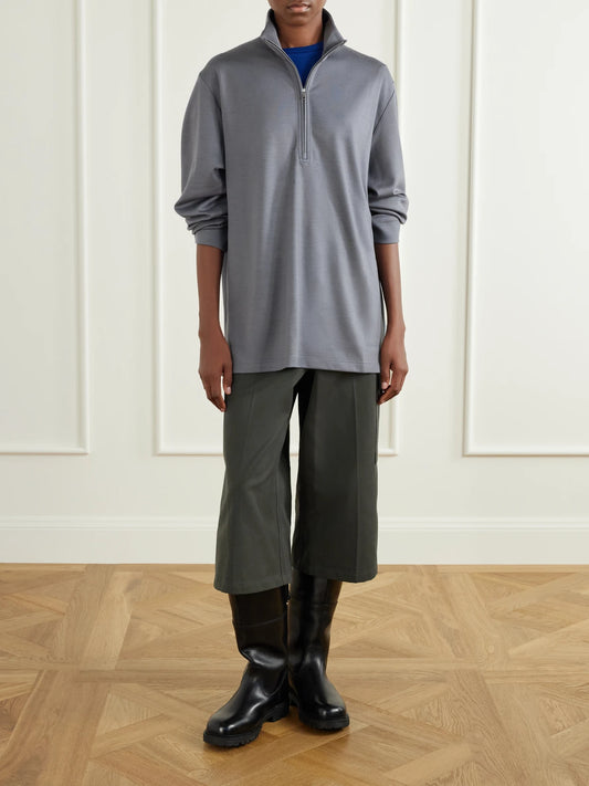 Image of a model wearing Tops. Product name - Cotton-jersey T-shirt in Blue colour by brand - RIER