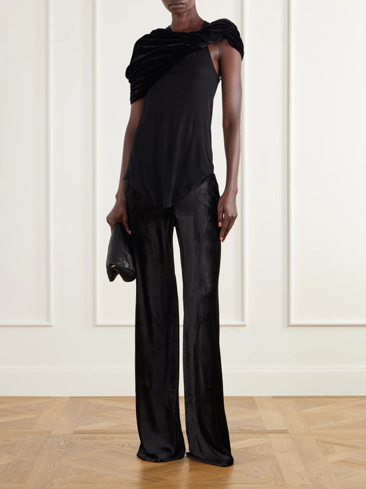 Image of a model wearing Tops. Product name - Twist Donut Cropped Crushed Velvet Cape in Black colour by brand - Rick Owens