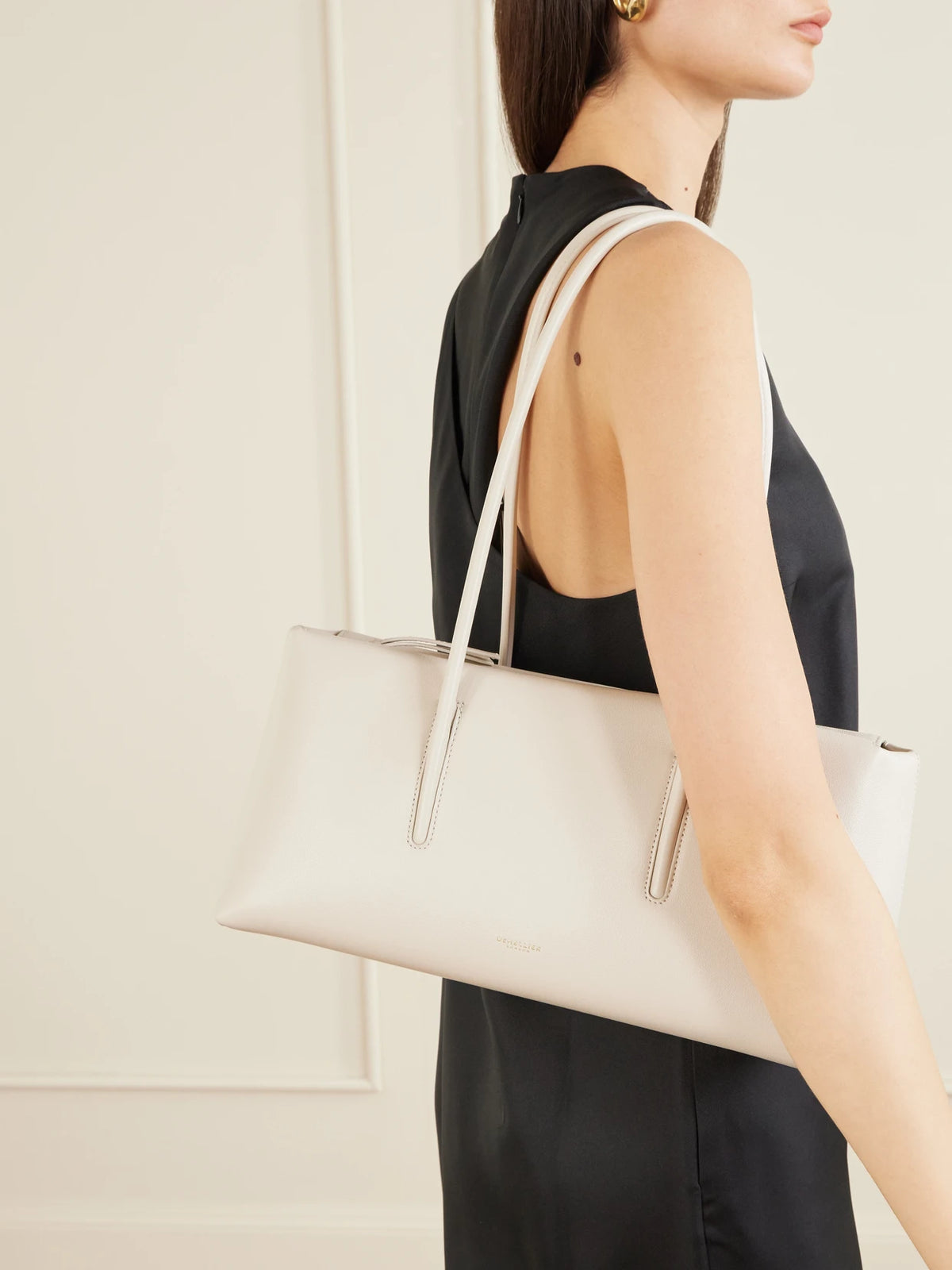 Image of Bags. Product name - The Stockholm Textured-leather Shoulder Bag in White colour by brand - DeMellier