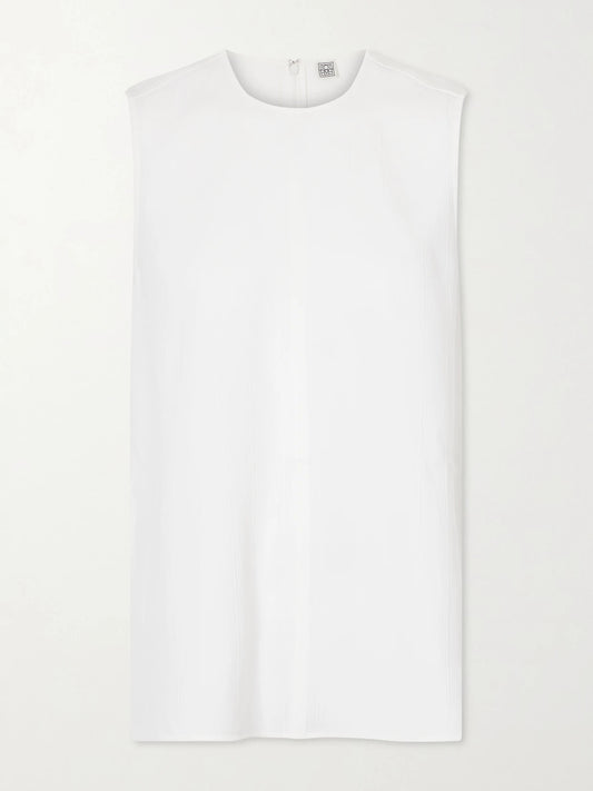 Image of a model wearing Tops. Product name - Woven Tank in Off-white colour by brand - TOTEME