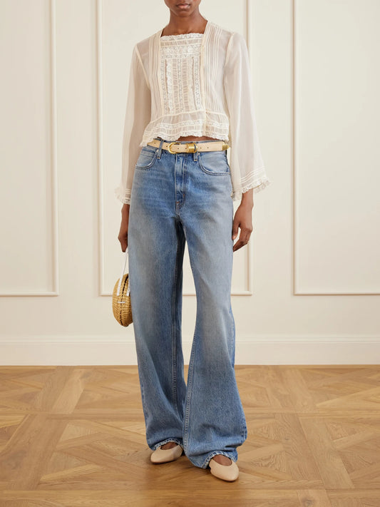 Image of a model wearing Tops. Product name - Lace-trimmed Silk-chiffon Shirt in Off-white colour by brand - DÔEN