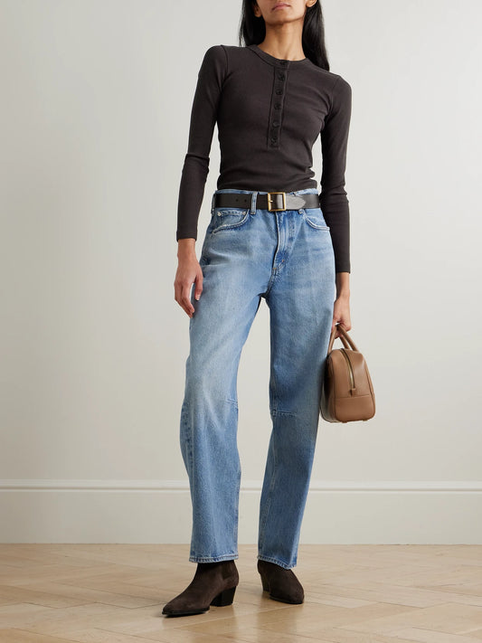 Image of a model wearing Tops. Product name - Varra Ribbed Stretch Organic Cotton And Lyocell-blend Henley Top in Chocolate colour by brand - Citizens of Humanity