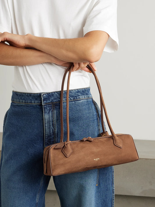 Image of Bags. Product name - Le Teckel Medium Nubuck Shoulder Bag in Brown colour by brand - Alaïa