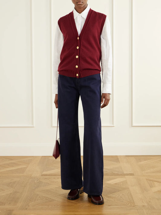 Image of a model wearing Outerwear. Product name - Highland Wool And Cashmere-blend Vest in Burgundy colour by brand - BLAZÉ Milano