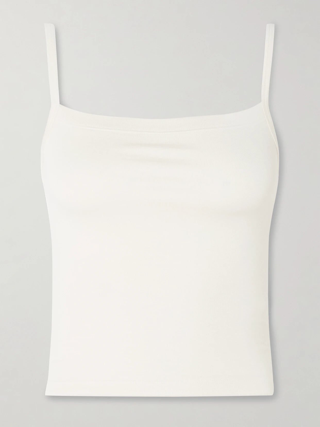 Image of a model wearing Tops. Product name - Stretch-modal Jersey Tank in Off-white colour by brand - ÉTERNE