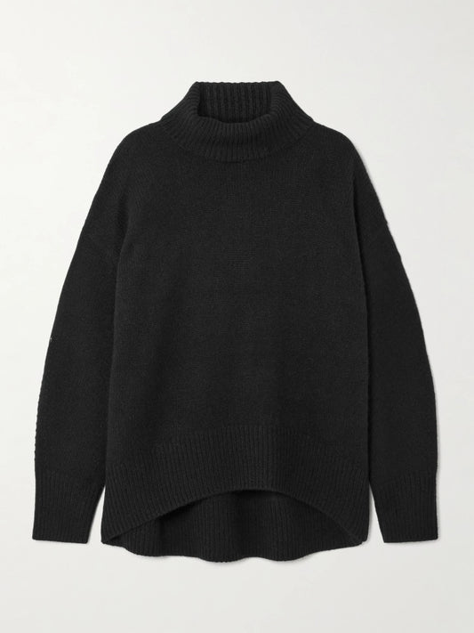 Image of a model wearing Outerwear. Product name - World's End Oversized Cashmere Turtleneck Sweater in Black colour by brand - Arch4