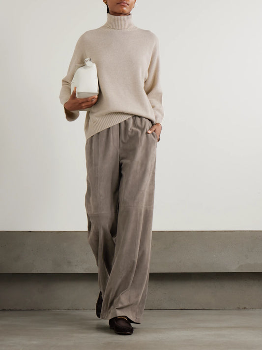Image of a model wearing Pants. Product name - Suede Wide-leg Pants in Taupe colour by brand - Brunello Cucinelli