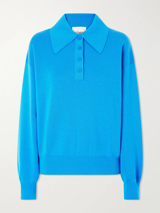 Image of a model wearing Outerwear. Product name - Claudia Knitted Wool Polo Shirt in Blue colour by brand - ALÉMAIS