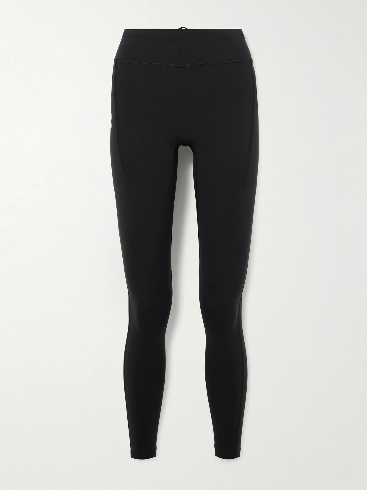 Image of a model wearing Pants. Product name - Performance Paneled Stretch Leggings in Black colour by brand - ON