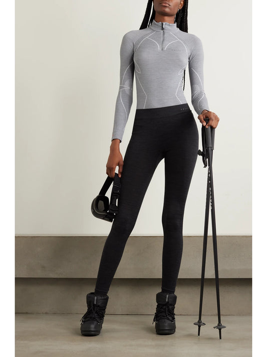 Image of a model wearing Pants. Product name - Technical Stretch Wool-blend Leggings in Black colour by brand - FALKE Ergonomic Sport System