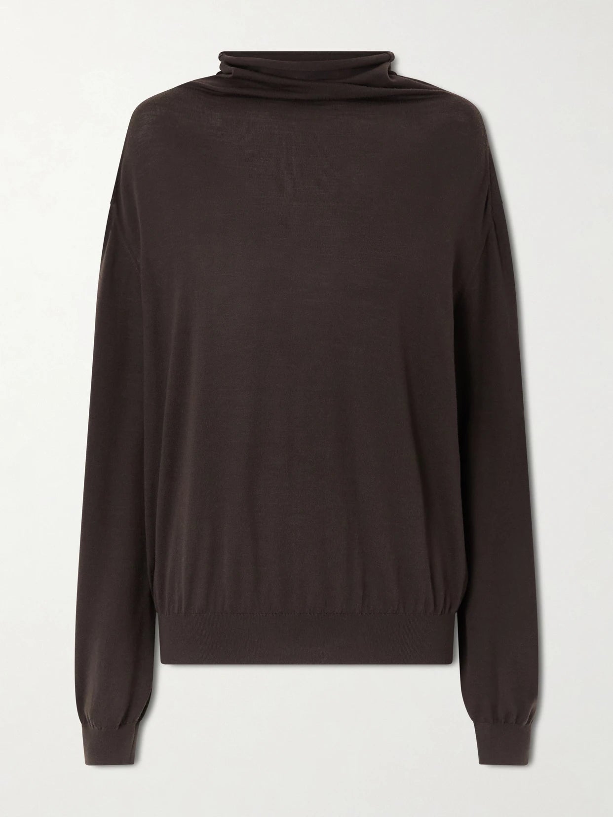 Image of a model wearing Outerwear. Product name - Annette Merino Wool Turtleneck Sweater in Dark brown colour by brand - KHAITE