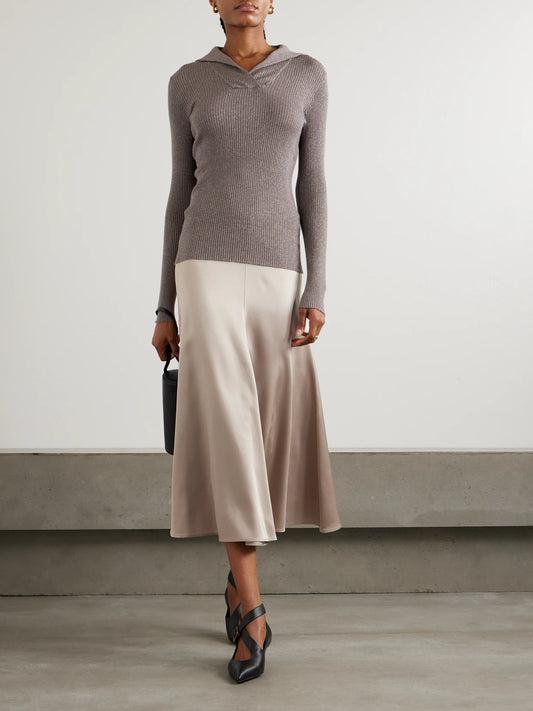 Image of a model wearing Outerwear. Product name - Ribbed Metallic Cashmere And Silk-blend Top in Dark brown colour by brand - Brunello Cucinelli