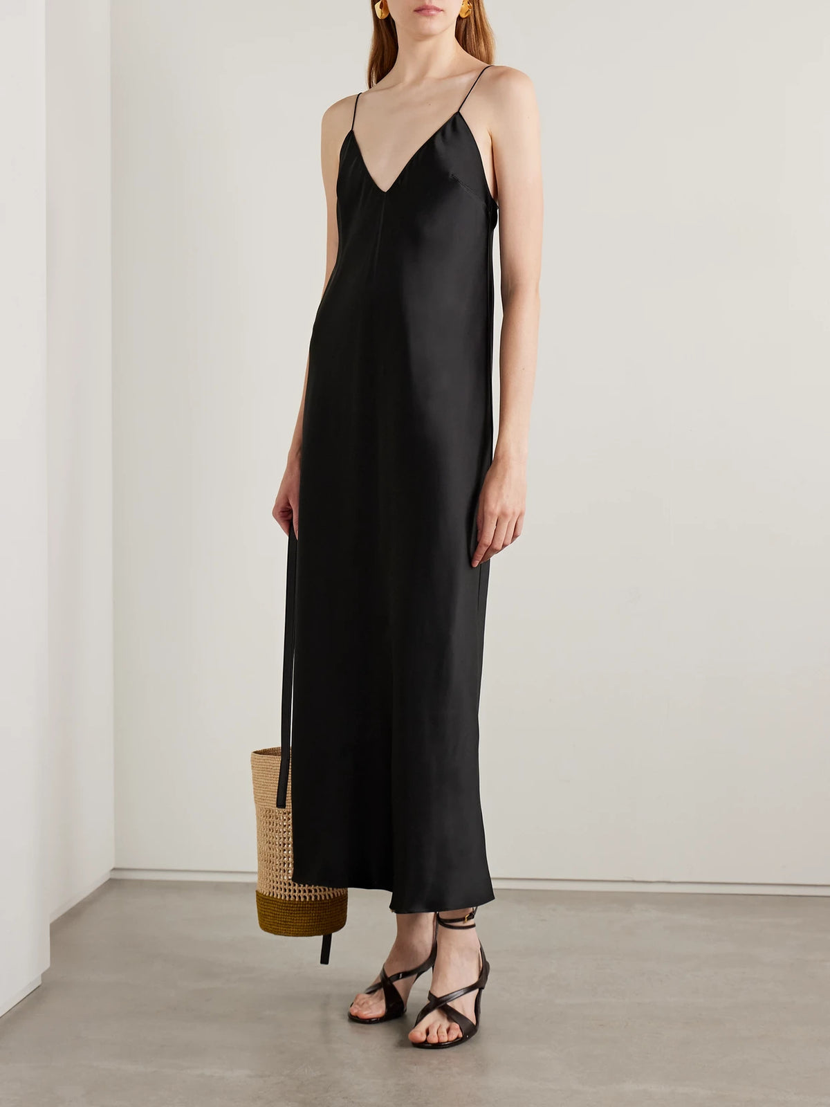Image of Dresses. Product name - Taja Satin Maxi Dress in Black colour by brand - KHAITE