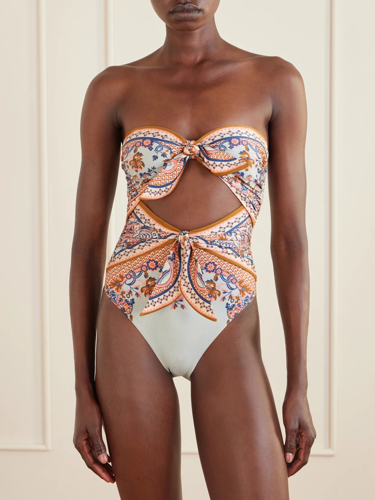 Image of Swimwear. Product name - Aster Strapless Knot-detailed Cut-out Printed Swimsuit in Blue colour by brand - Zimmermann