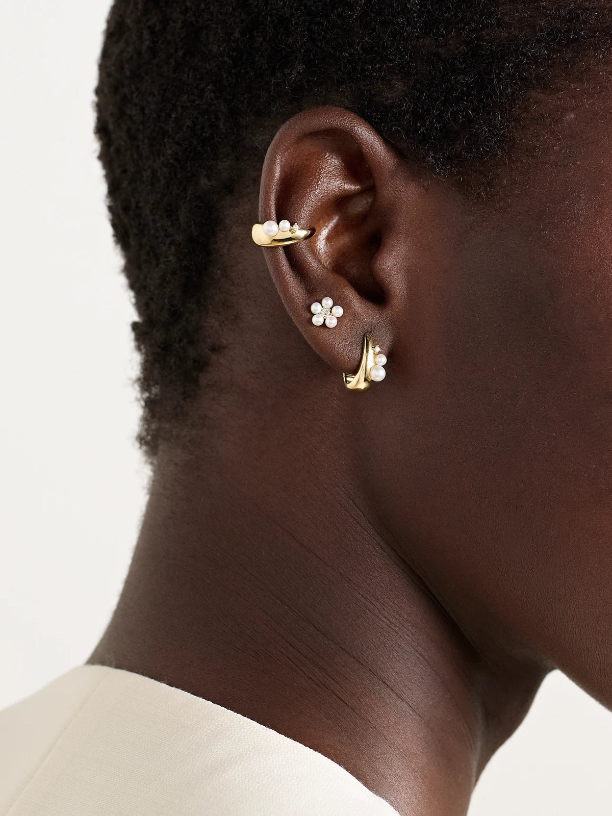 Image of Earrings. Product name - 14-karat Gold, Pearl And Diamond Ear Cuff in Multi colour by brand - Mizuki