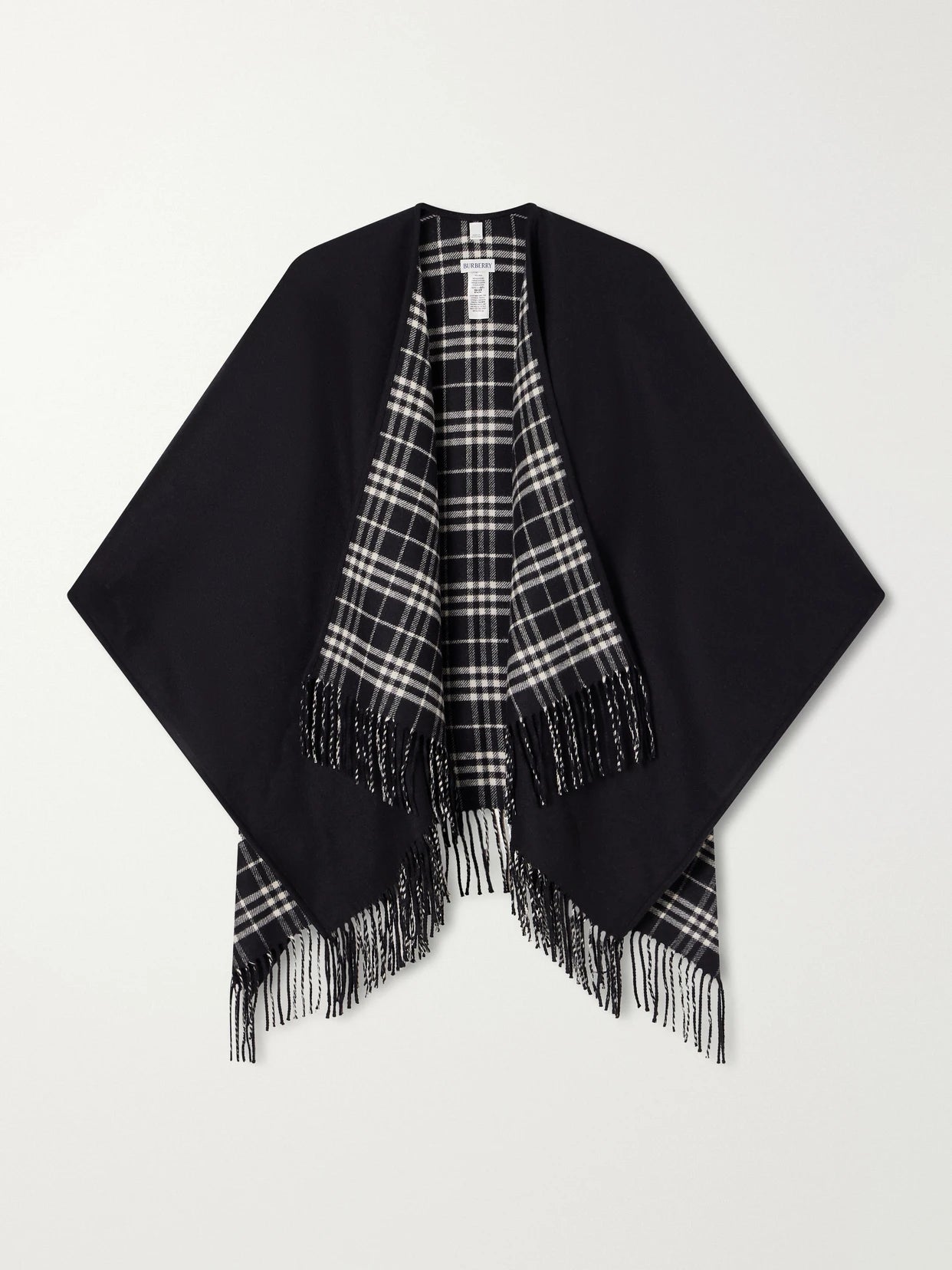 Image of Coats & Jackets. Product name - Reversible Fringed Checked Wool Cape in Black colour by brand - Burberry