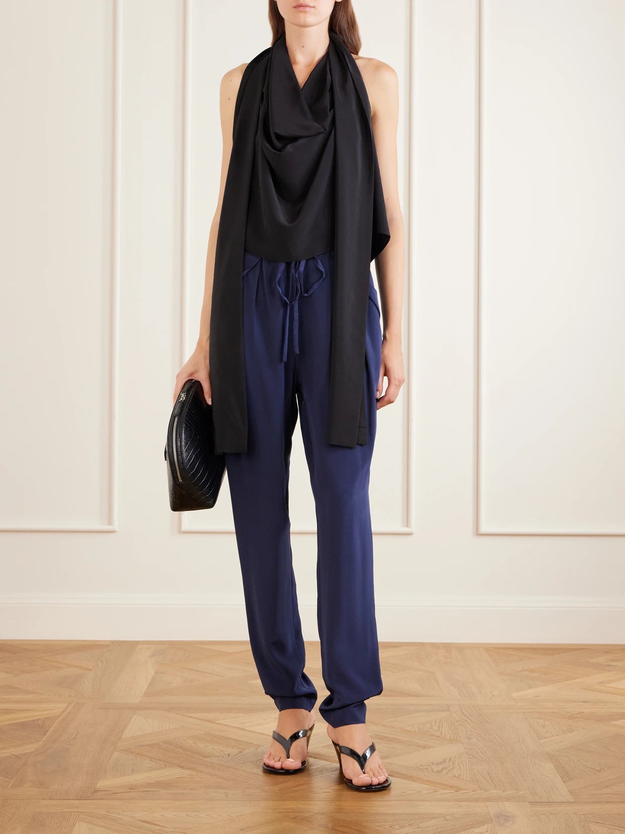 Image of a model wearing Tops. Product name - Tie-detailed Silk Tank in Black colour by brand - Sharon Wauchob