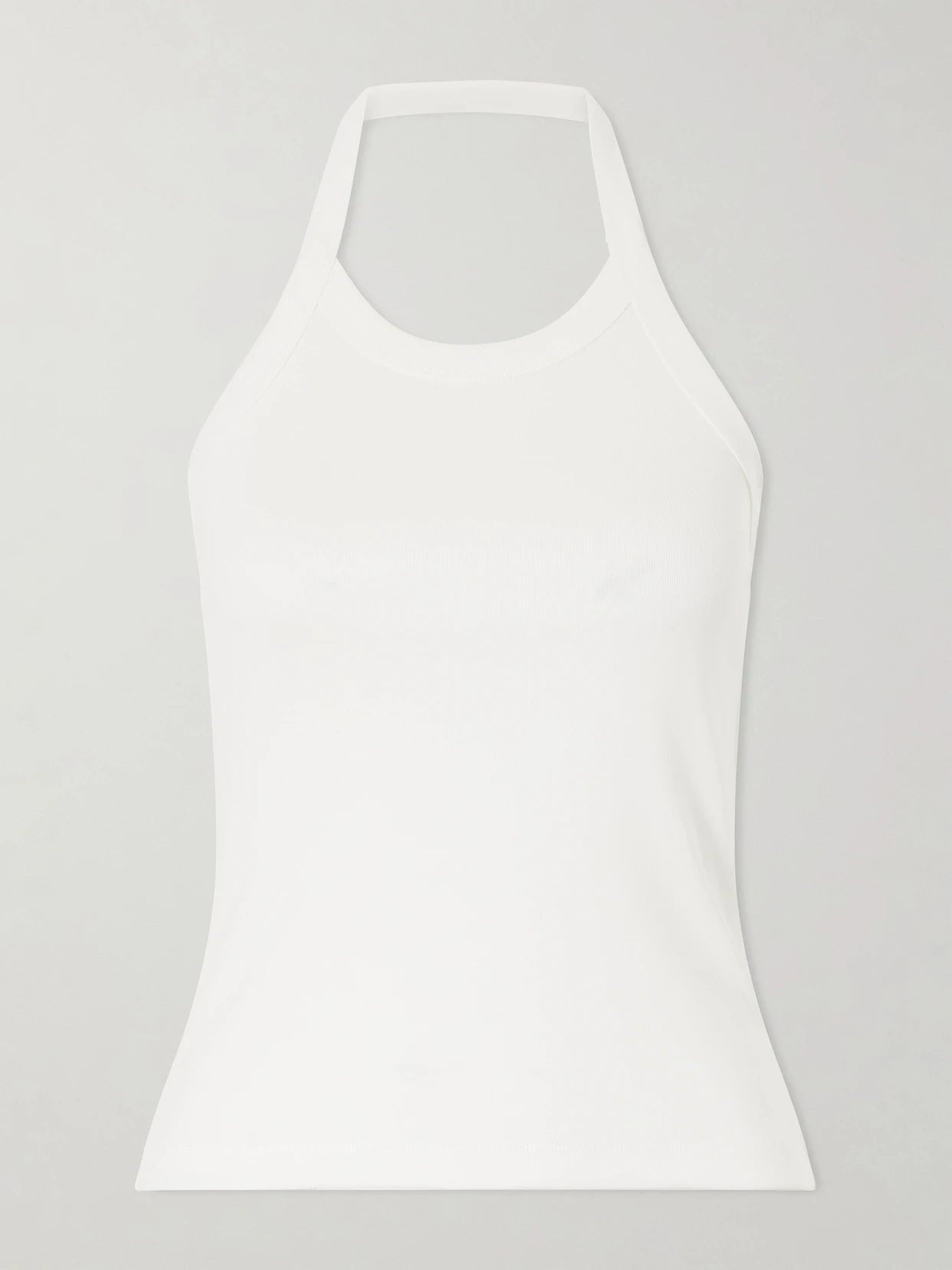 Image of a model wearing Tops. Product name - Angie Organic Cotton-jersey Halterneck Tank in White colour by brand - FLORE FLORE