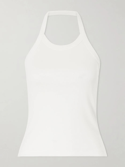Image of a model wearing Tops. Product name - Angie Organic Cotton-jersey Halterneck Tank in White colour by brand - FLORE FLORE