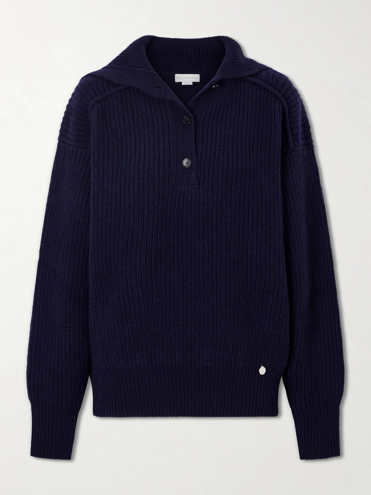 Image of a model wearing Outerwear. Product name - Ribbed-knit Cashmere And Wool-blend Turtleneck Sweater in Navy colour by brand - Stella McCartney