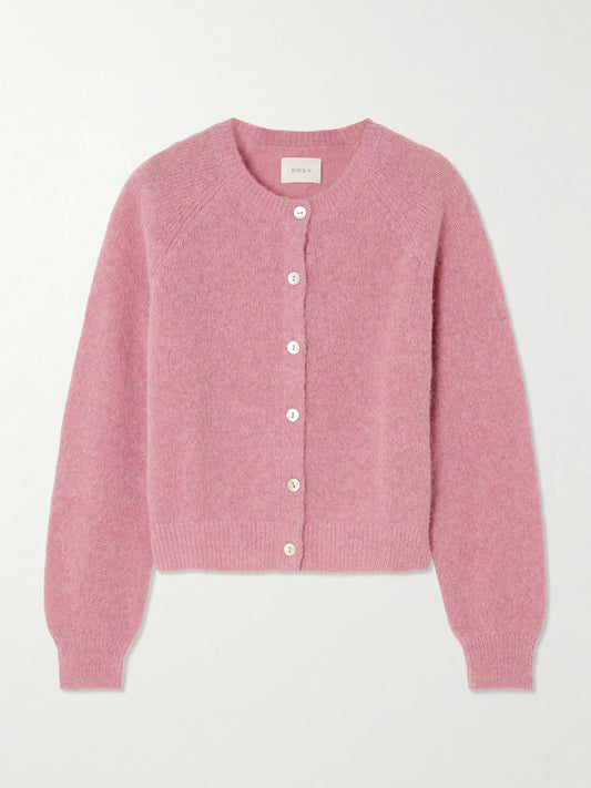 Image of a model wearing Outerwear. Product name - Petra Knitted Cardigan in Pink colour by brand - DÔEN