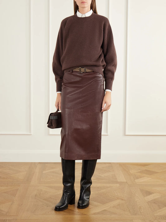 Image of a model wearing Skirts. Product name - Paneled Leather Midi Skirt in Burgundy colour by brand - Brunello Cucinelli