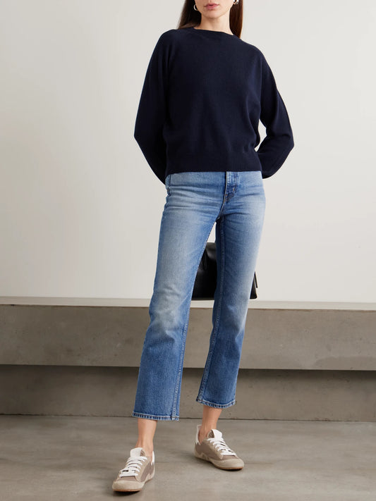 Image of a model wearing Outerwear. Product name - Cashmere Sweater in Navy colour by brand - Jamie Haller