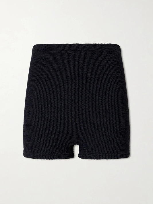 Image of a model wearing Shorts. Product name - Crinkle Cotton-blend Original Crinkle Shorts in Black colour by brand - Hunza G