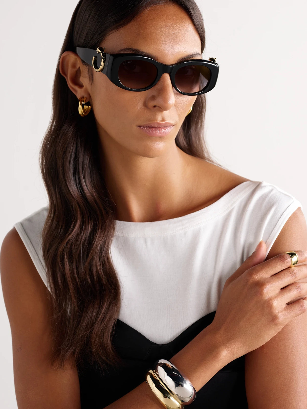Image of Sunglasses. Product name - Panthère Classic Oval-frame Acetate Sunglasses in Black colour by brand - Cartier Eyewear