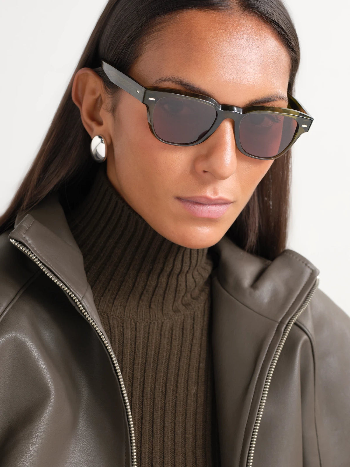 Image of Sunglasses. Product name - Rueny D-frame Acetate Sunglasses in Brown colour by brand - Oliver Peoples