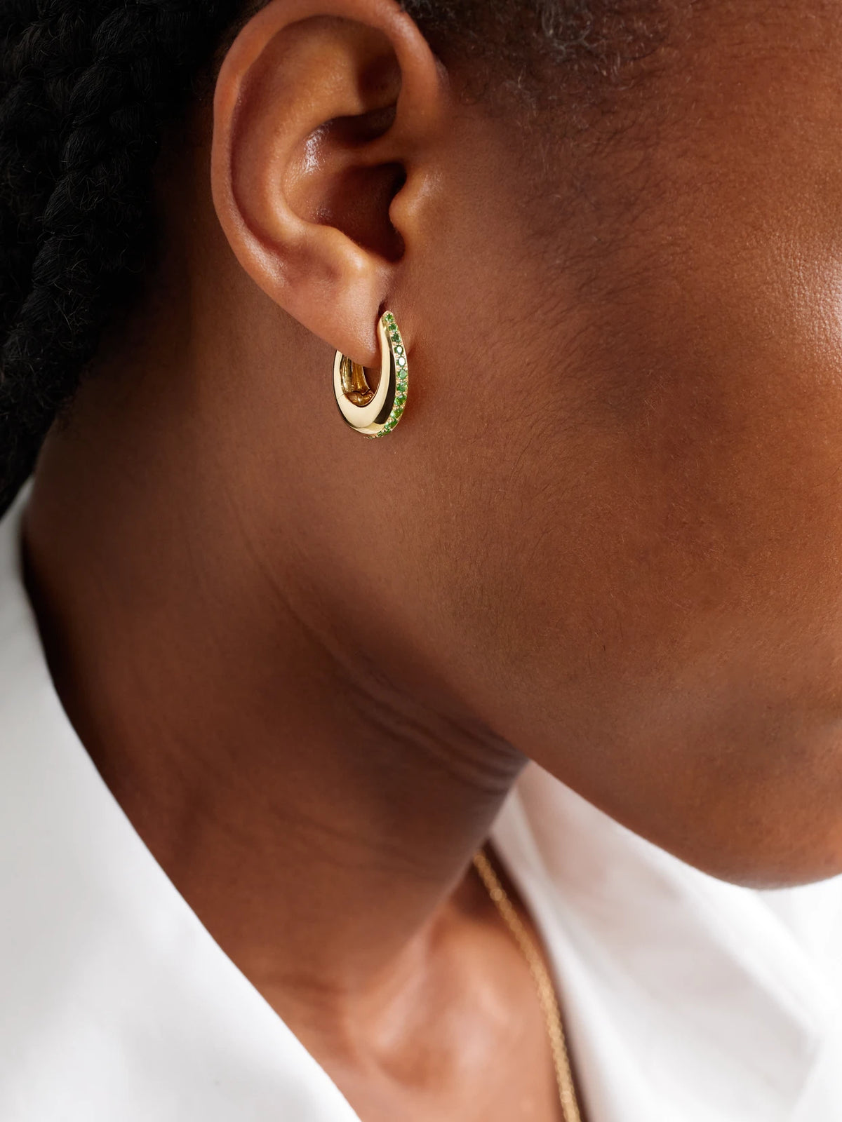 Image of Earrings. Product name - Chakra Icon 18-karat Gold Tsavorite Hoop Earrings in Green colour by brand - Ananya